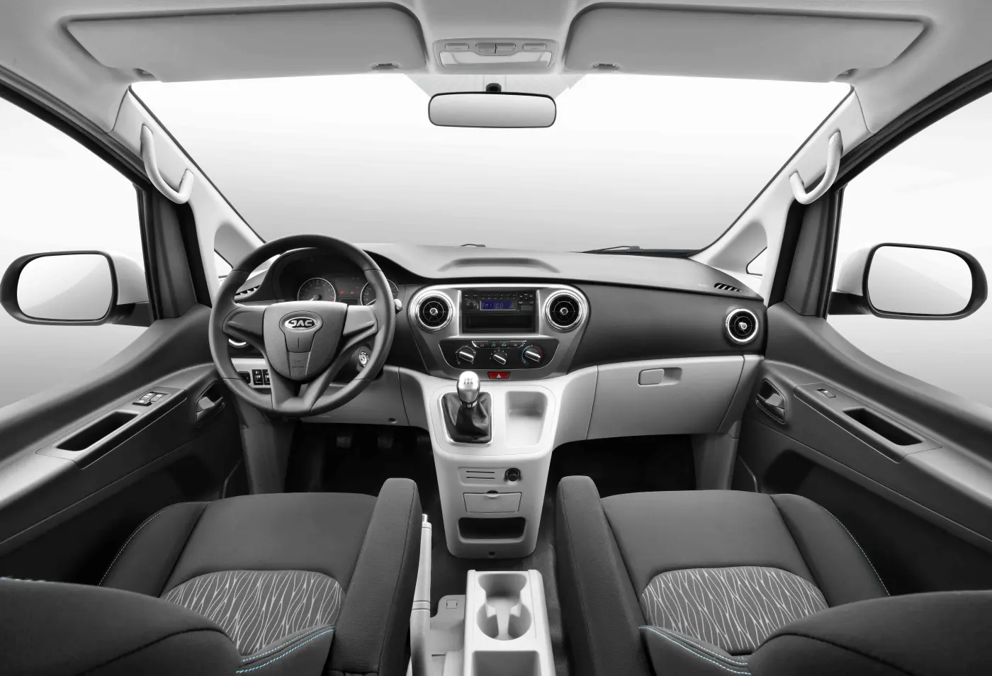 JAC JS6 premium crossover side profile view in motion on scenic highway modern design silver color