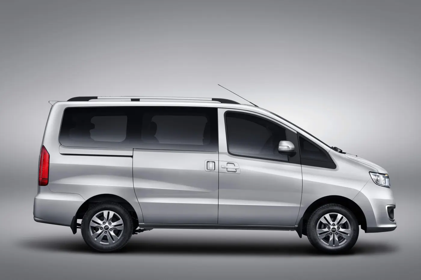 JAC JS6 rear view with LED taillights at dusk city background cinematic lighting modern design