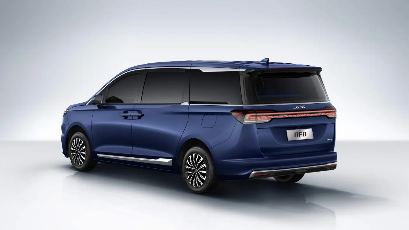 JAC JS6 premium crossover side profile view in motion on scenic highway modern design silver color