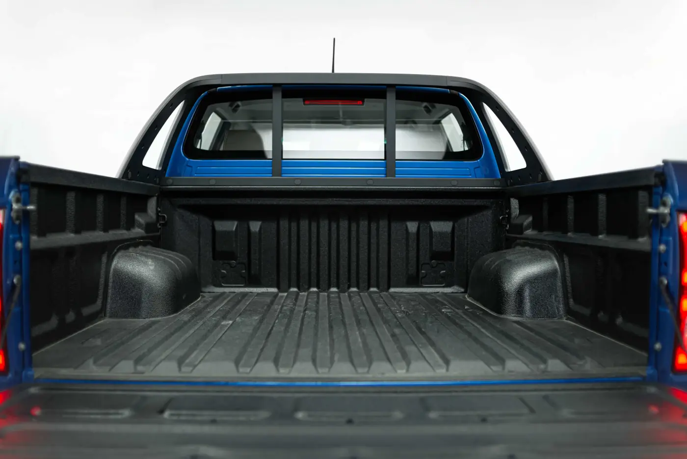 JAC JS6 rear view with LED taillights at dusk city background cinematic lighting modern design