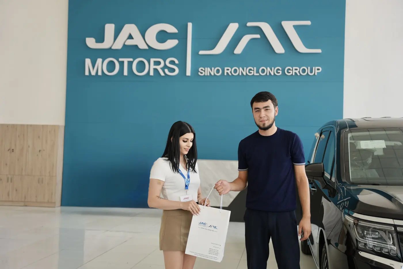 happy family receiving keys to new JAC car from dealership manager, customer satisfaction moment, professional photography
